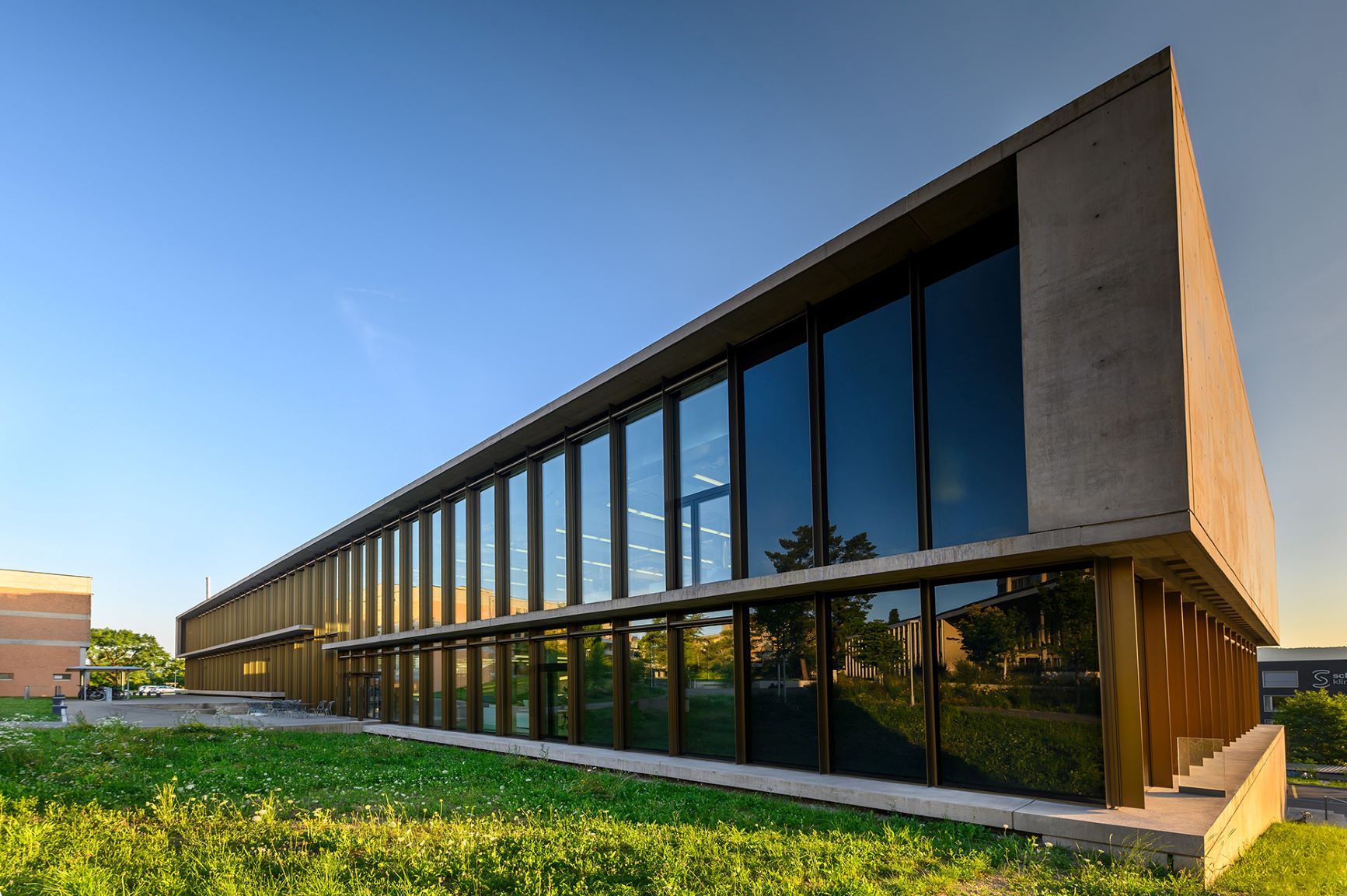 The modern building housing the X23D office in Zurich